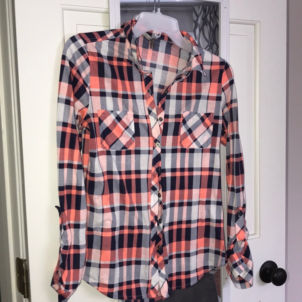 Long sleeve plaid shirt.